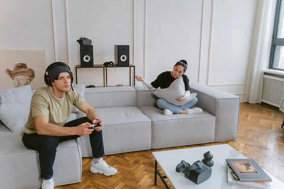 Image of a gamer sitting on a couch with a controller in hand, enjoying gaming sessions.